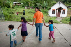 In a Christian community in Bolivia, World Vision staff lead children to to a small chapel for activities. &copy;2011 World Vision, Jon Warren