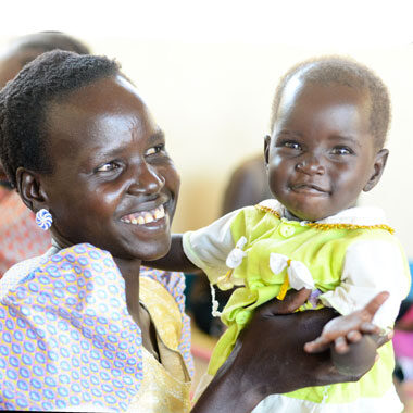 Woman holding a baby