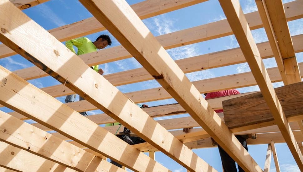 men building new roof