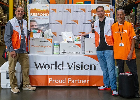 World Vision workers smiling