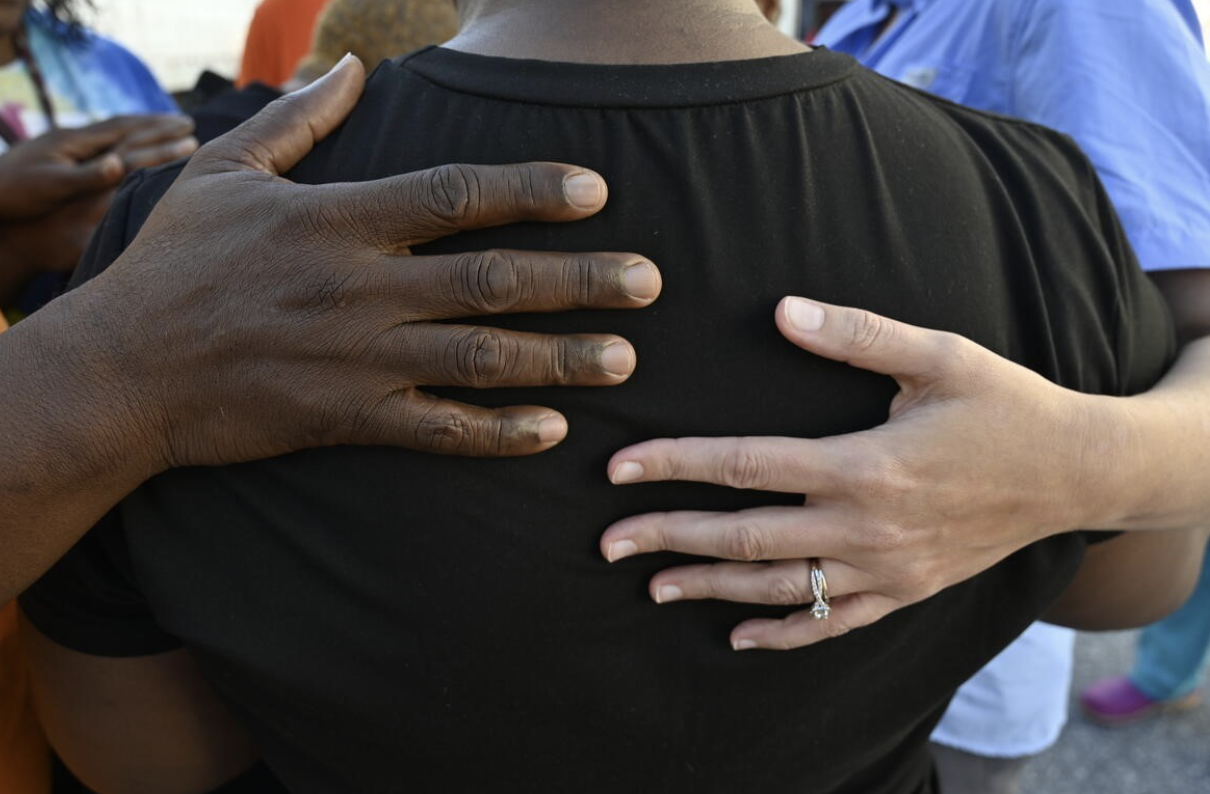 People gather during a World Vision&ndash;supported distribution of Hurricane Helene relief supplies in Arden, North Carolina, with staff and volunteers, offering hope and help to impacted families. (&copy; 2024 World Vision/photo by Tom Costanza)&nbsp;